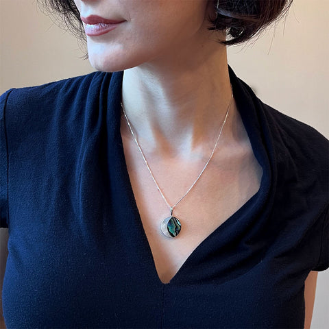Fair trade abalone pearl moon necklace handmade by artisans in Bali