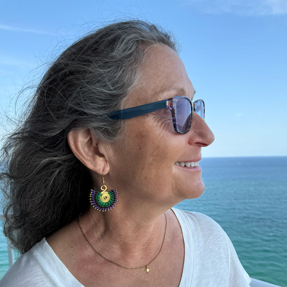 Fair trade brass earrings handmade by artisan in Nepal