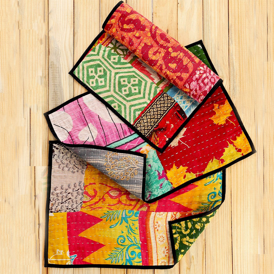 Fair trade recycled sari placemats handmade by artisans in India.