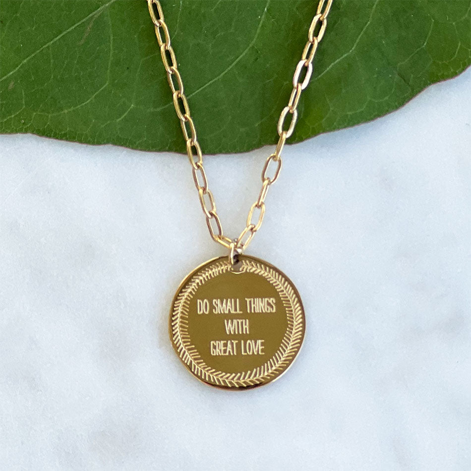Fair trade gold necklace handmade by survivors of human trafficking