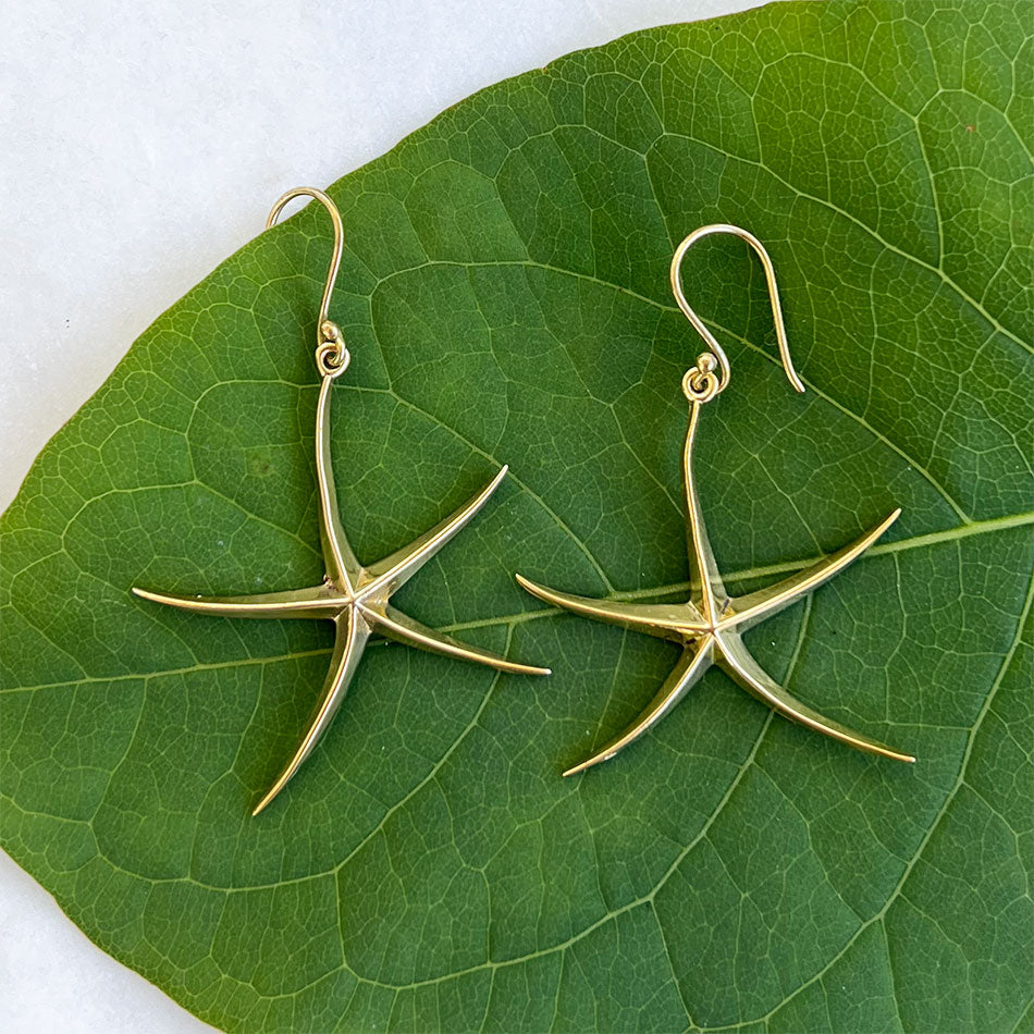 Fair trade starfish brass earrings handmade by artisans in India