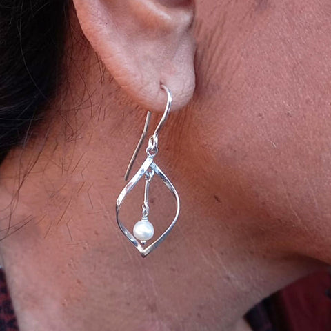 Ethically handmade brass pearl earrings Bali