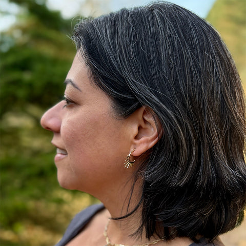 Fair trade sun hoops handmade by artisans in India.