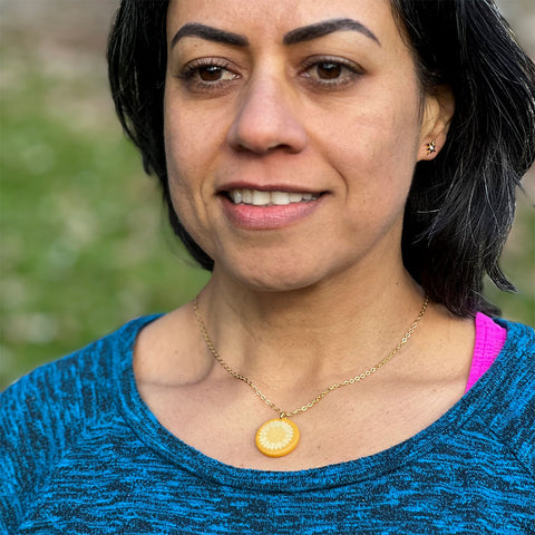 Fair trade sunflower tagua necklace