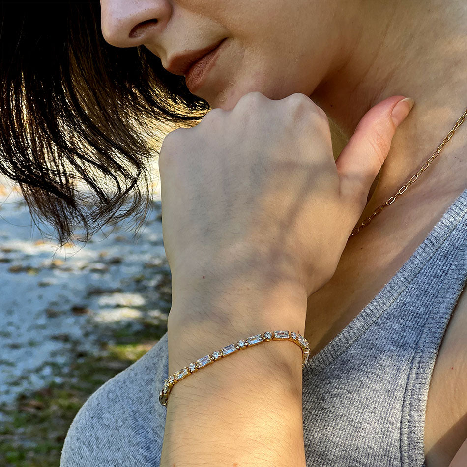 Fair trade tennis bracelet human trafficking on model