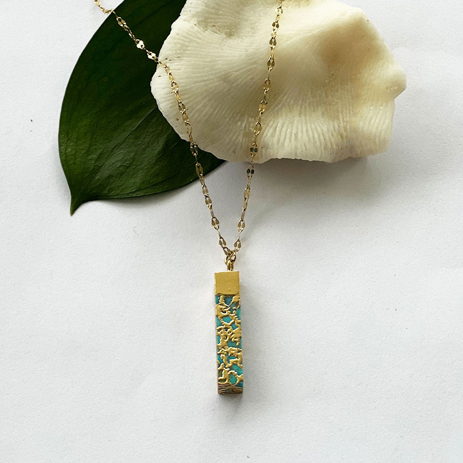 Fair trade turquoise bar necklace handmade by survivors of human trafficking