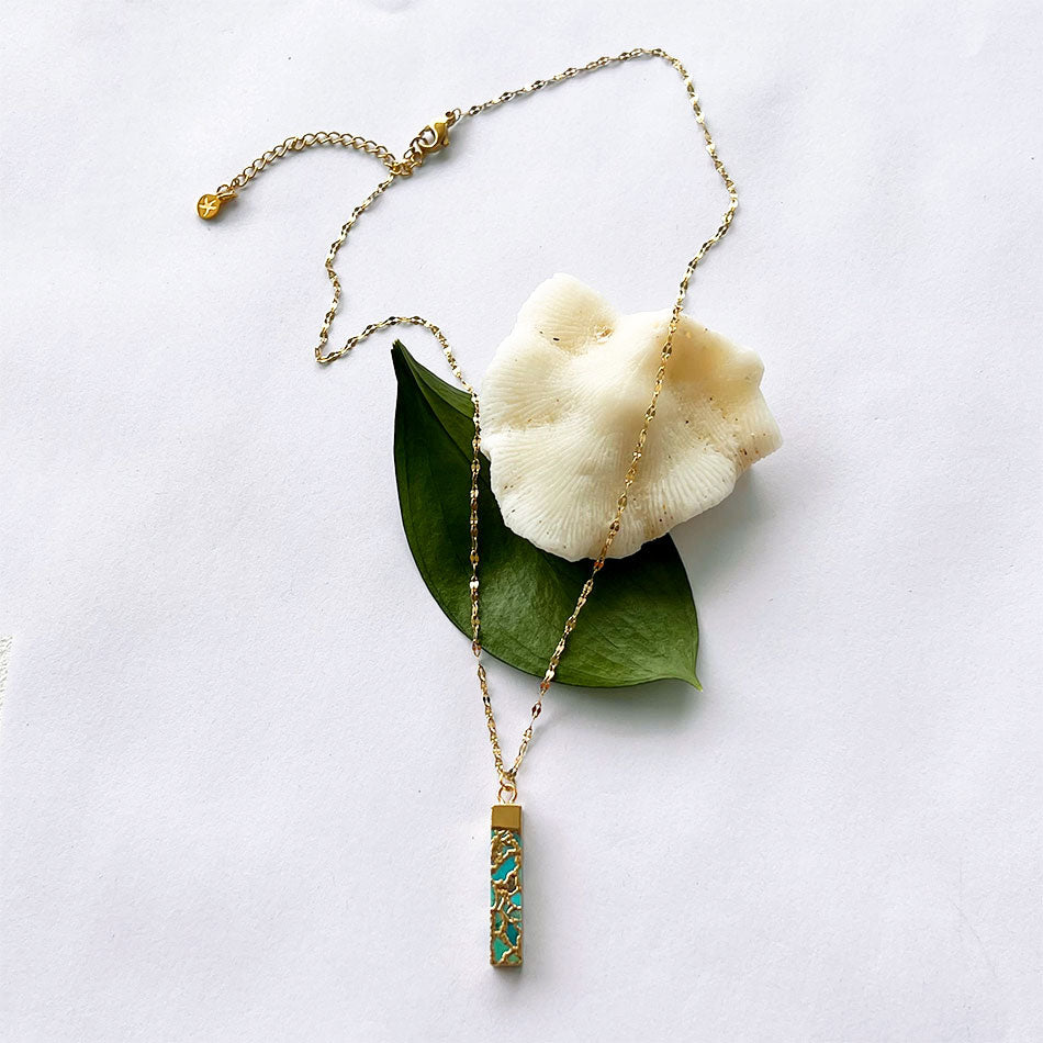 Fair trade turquoise bar necklace human trafficking