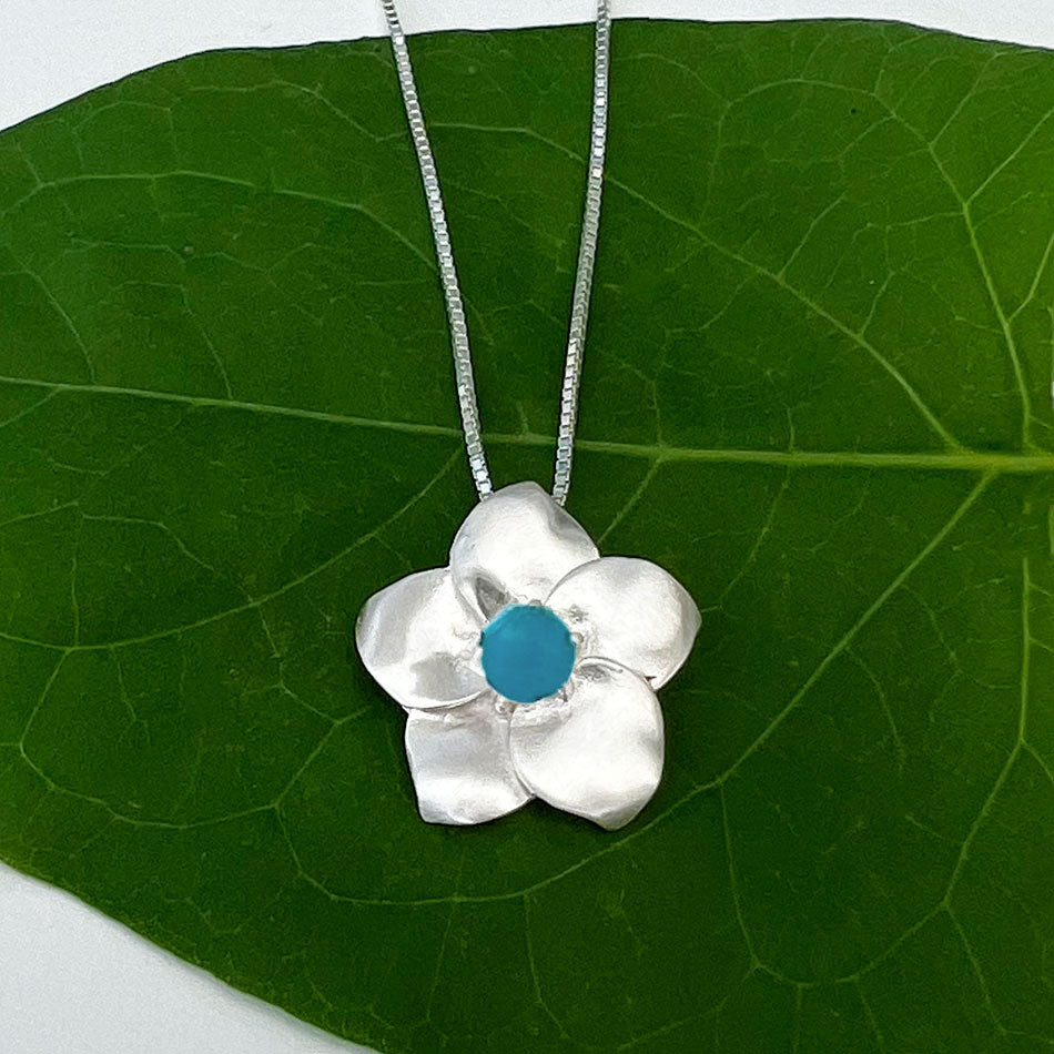 Fair trade turquoise sterling flower pendant