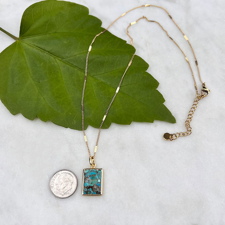 Fair trade turquoise necklace handmade by survivors of human trafficking for size