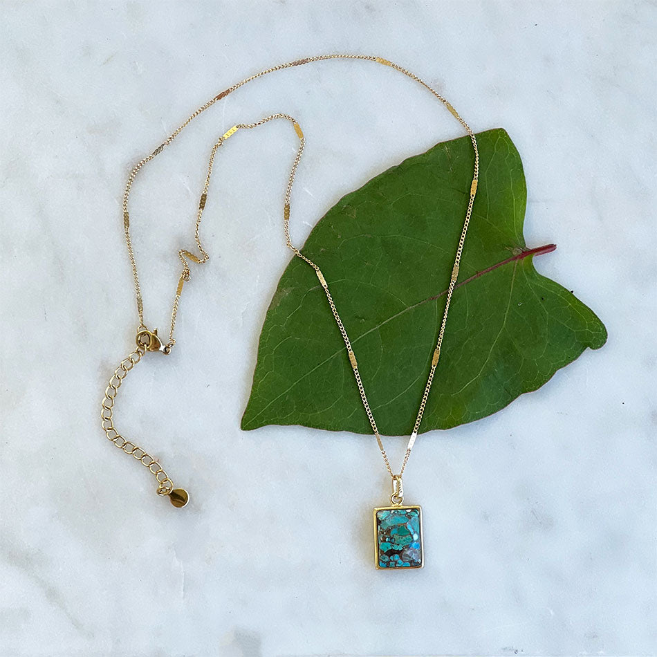 Fair trade turquoise necklace handmade by survivors of human trafficking