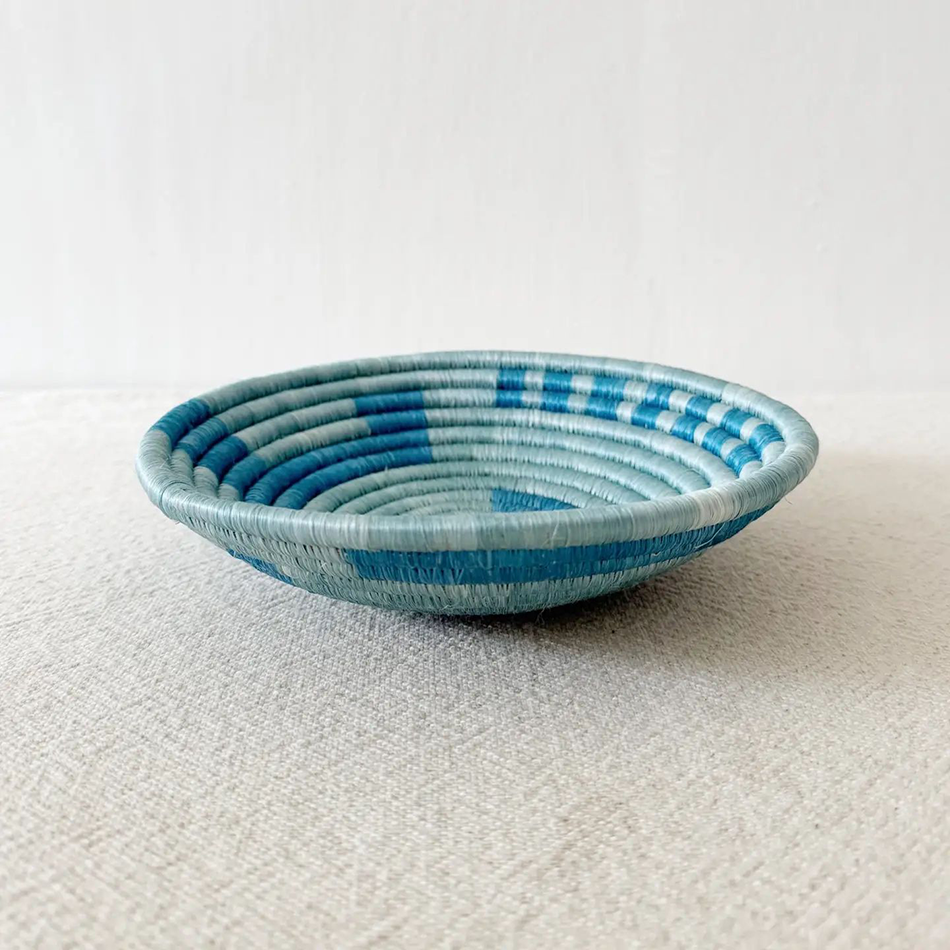Fair trade sisal sweetgrass bowl basket in blue colors handmade in Rwanda.