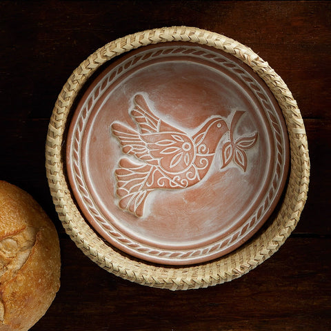 Fair trade peace dove bread warmer with terra cotta stone.
