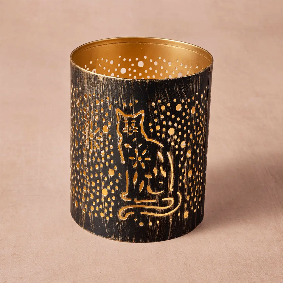 Fair trade metal tealight candle holder with cat design.