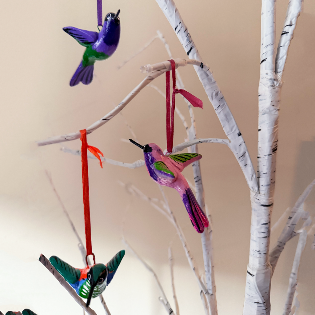 Fair trade hand-painted ceramic colorful hummingbird ornaments.