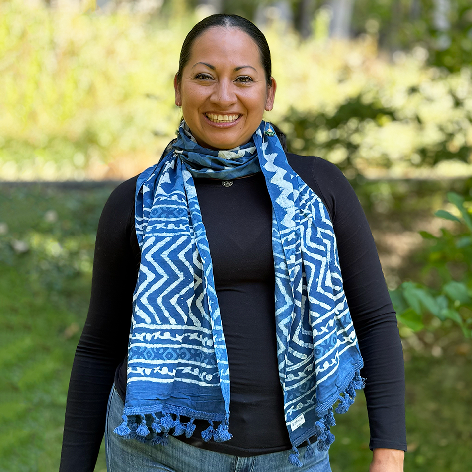 Fair trade indigo cotton scarf with zig zag design and pom poms.