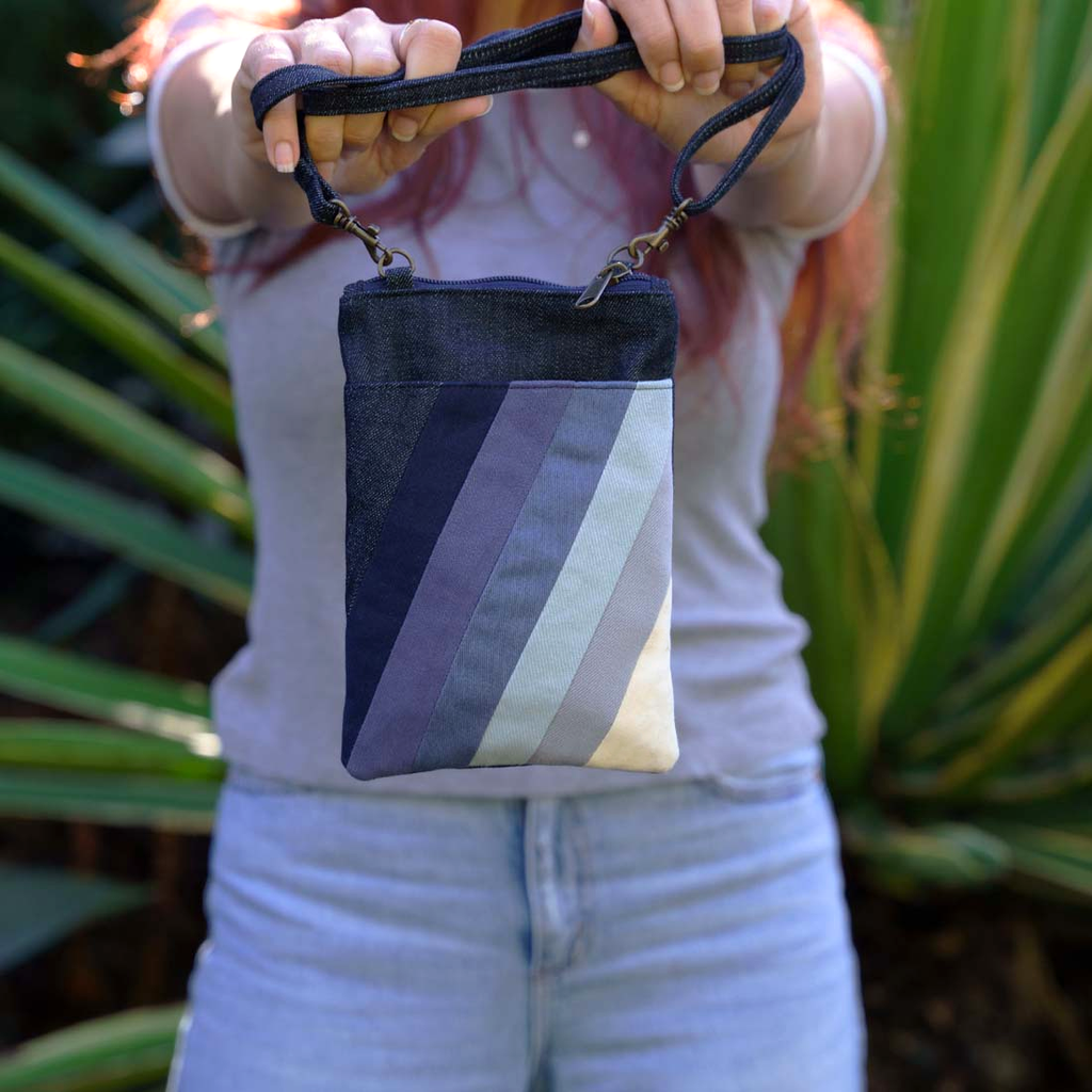 Recycled cotton denim stripe cell phone crossbody bag.