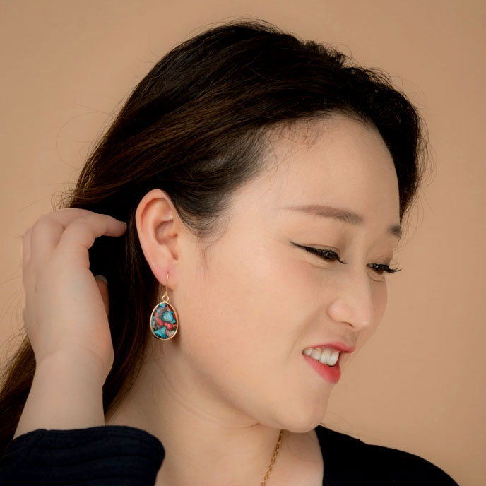 Fair trade earrings handmade out of multi-colored jasper stone with blue and red.