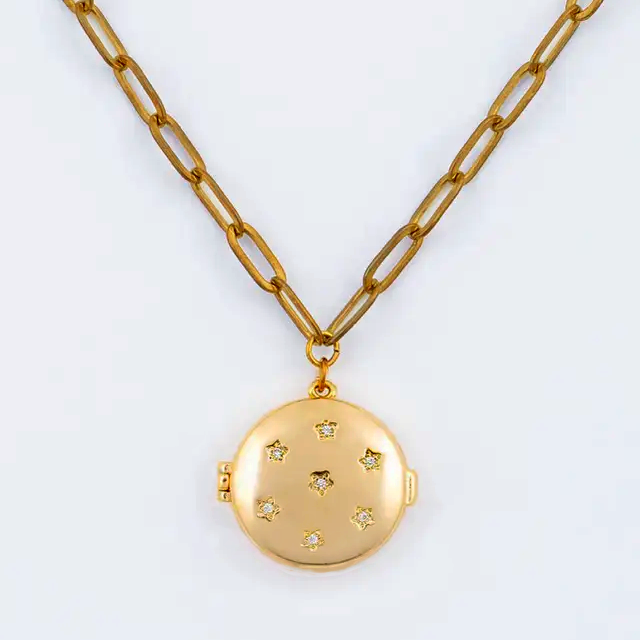 Fair trade gold-plated locket with crystal stars.