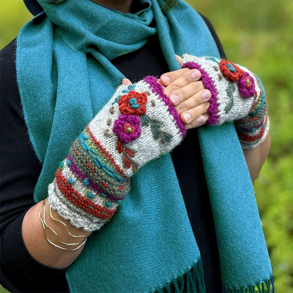 Fair trade fingerless wool gloves knitted by women in Nepal.