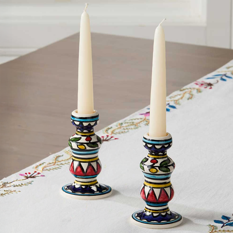 Ceramic hand-painted white candle holders with colorful design