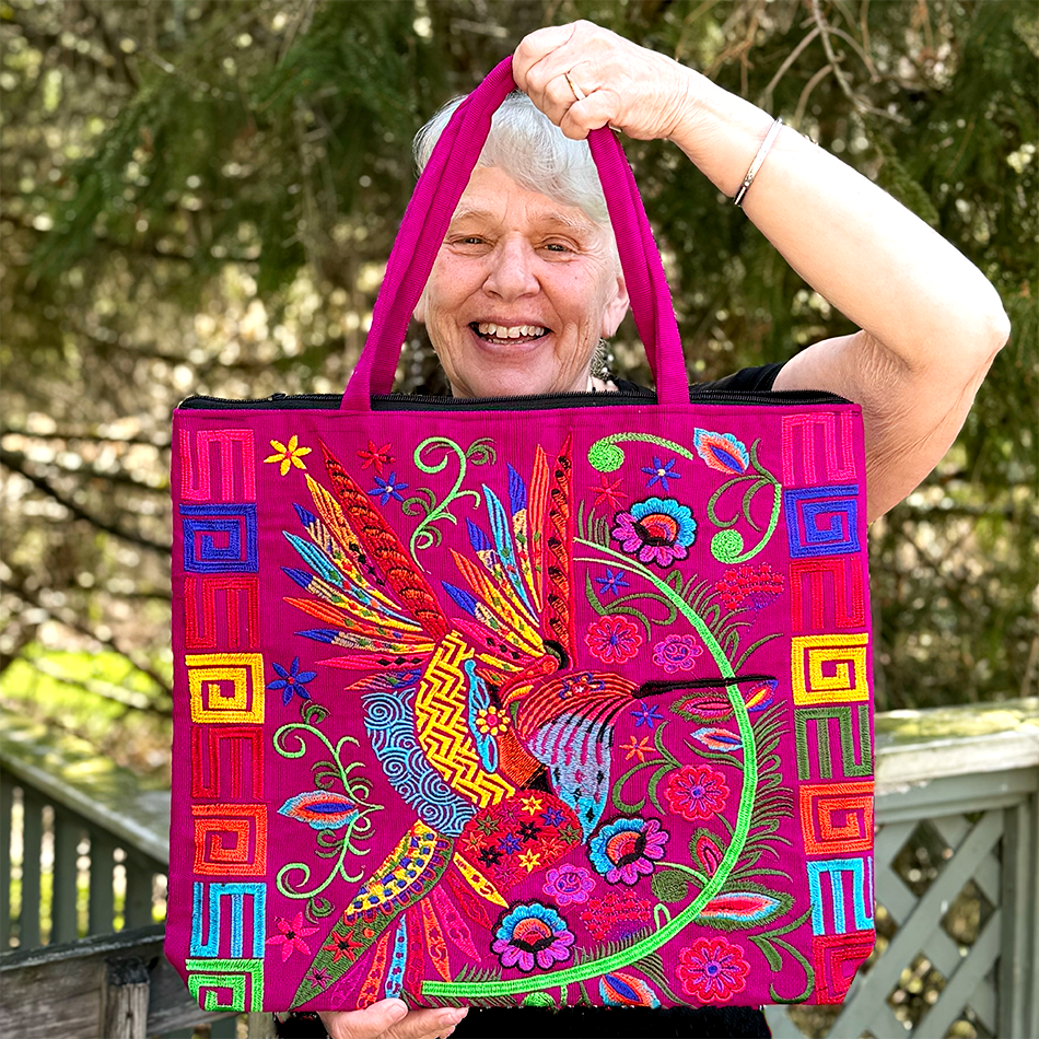 Large pink embroidered tote bag with colorful birds