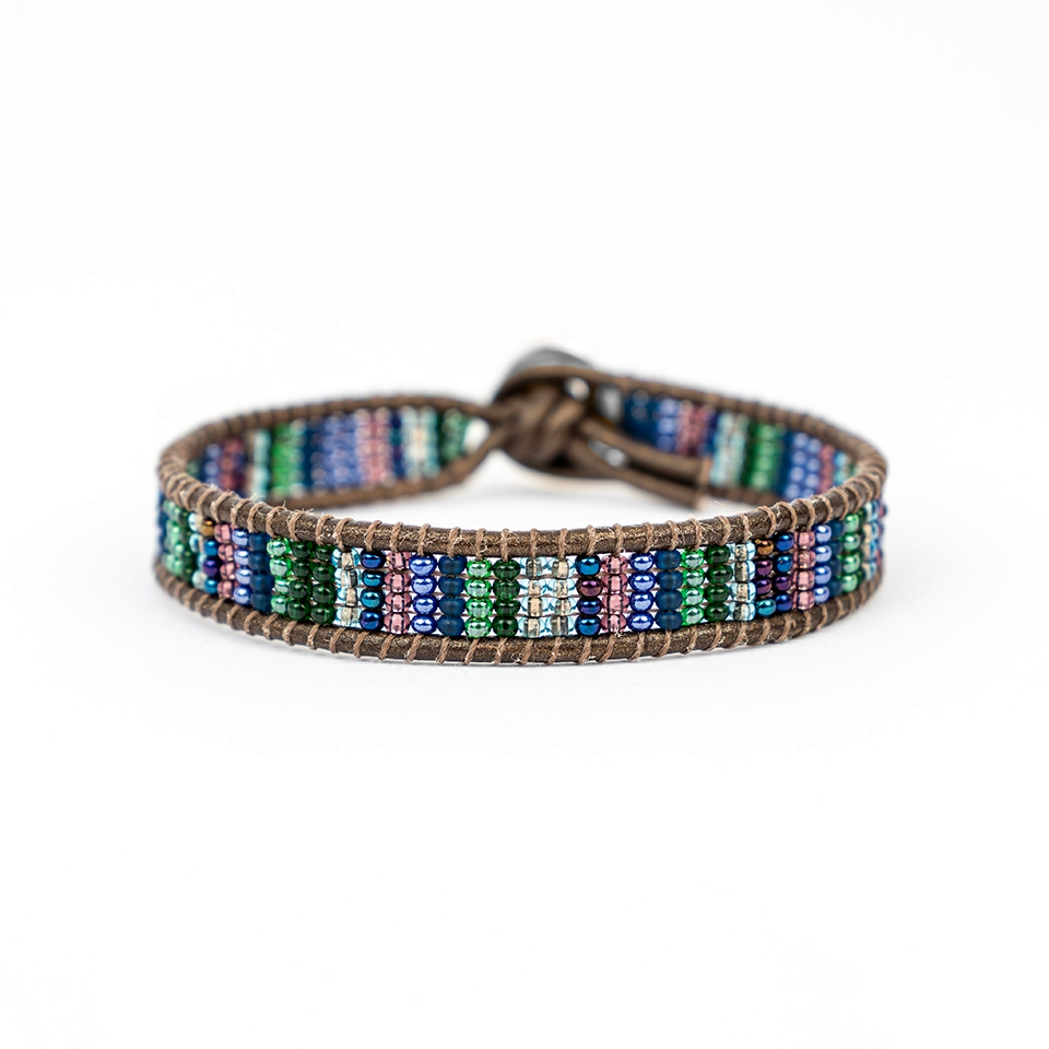 Colorful striped bead bracelet on leather