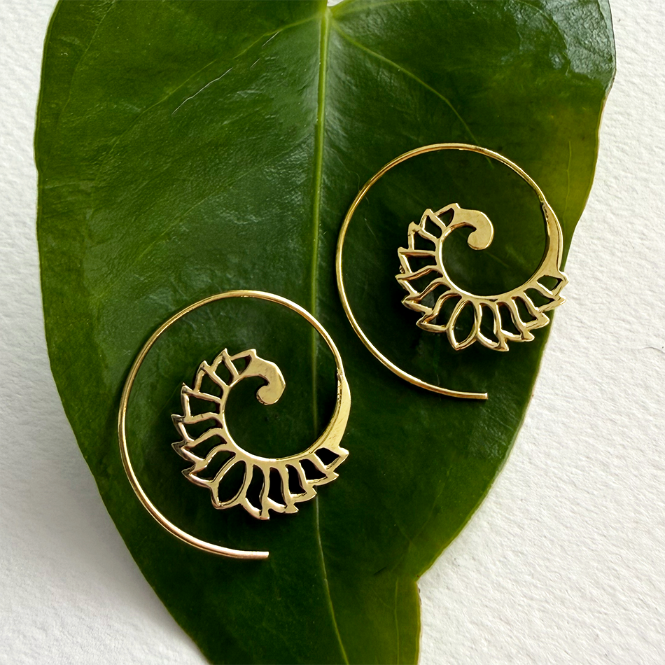 Brass spiral earrings with cutout design
