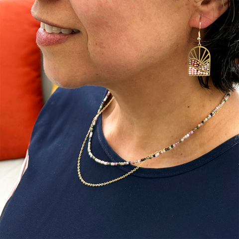 Brass sun design earrings with pink beads