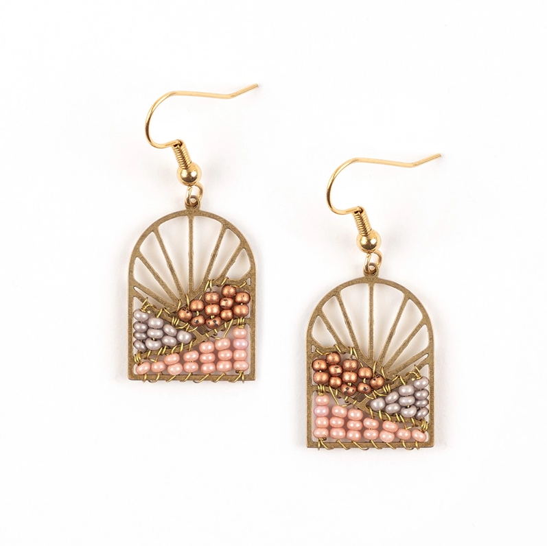 Brass sun design earrings with pink beads