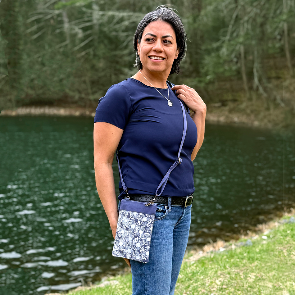 Recycled cotton small crossbody bag with black and tan flowers.