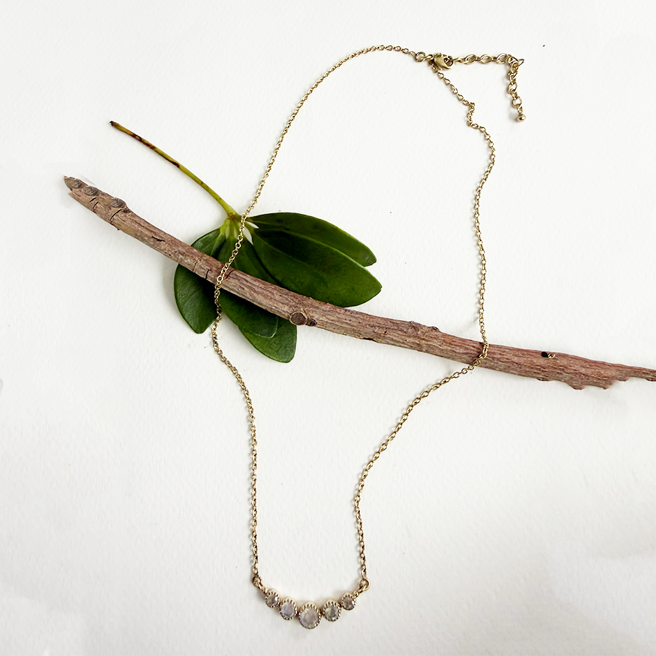 Brass necklace with 5 small moonstones and delicate chain.