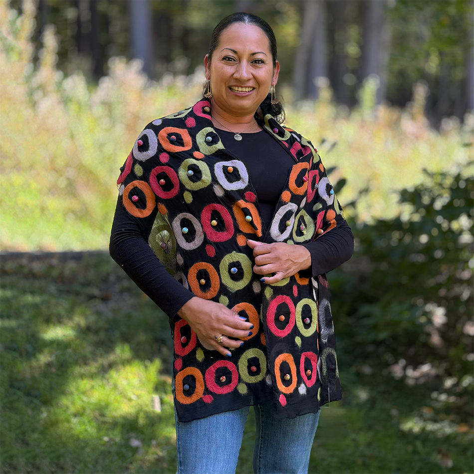Fair trade silk felted black scarf with orange, purple and green circles.