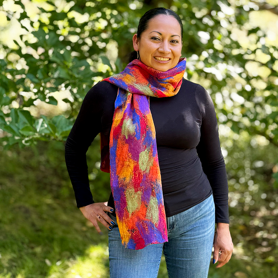 Fair trade felted silk scarf reds oranges blues bright.