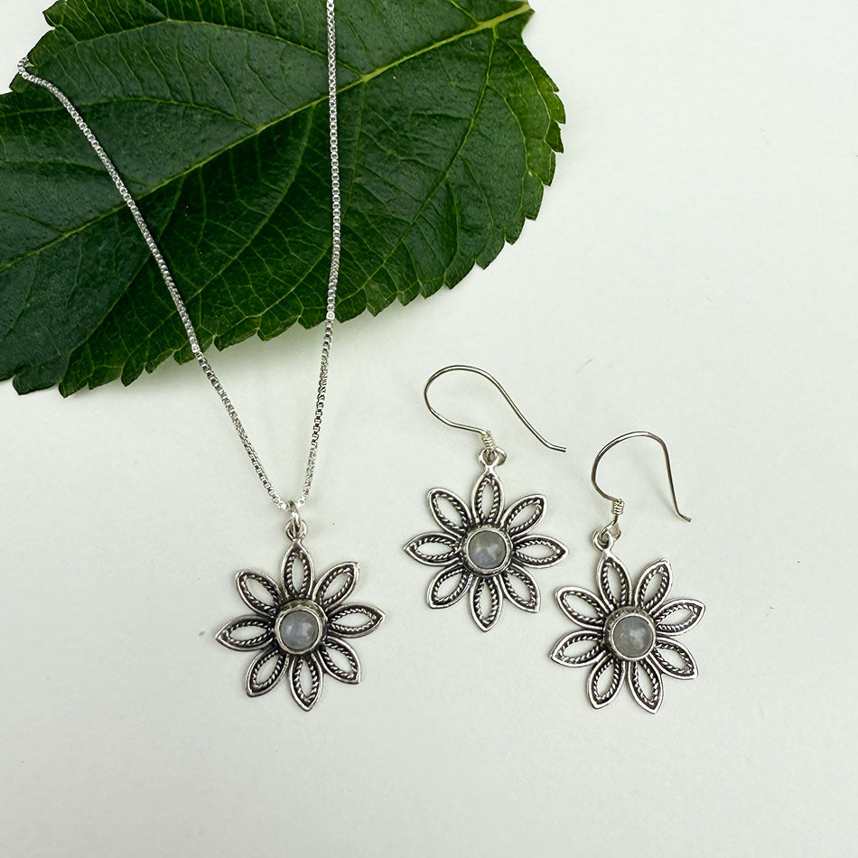 Fair trade flower moonstone sterling silver earrings.