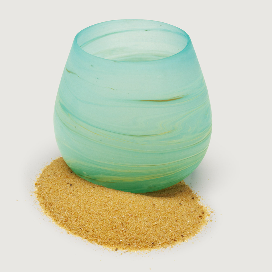 Light green blue glass candle holder with votive and sand