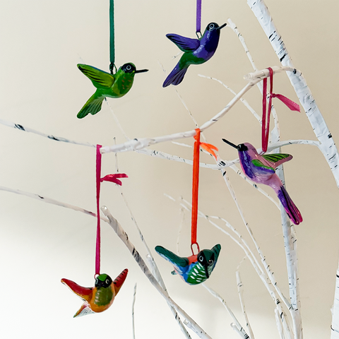 Fair trade hand-painted ceramic colorful hummingbird ornaments.