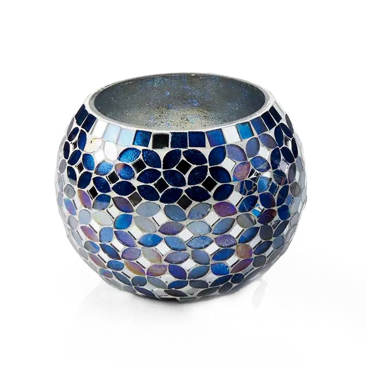 Fair trade candle holder with colorful mosaic glass pattern.