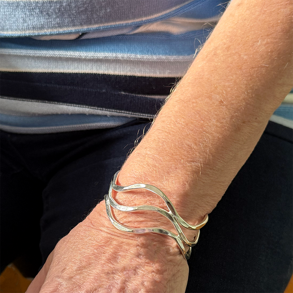 Silver-plated brass hammered cuff adjustable fair trade.