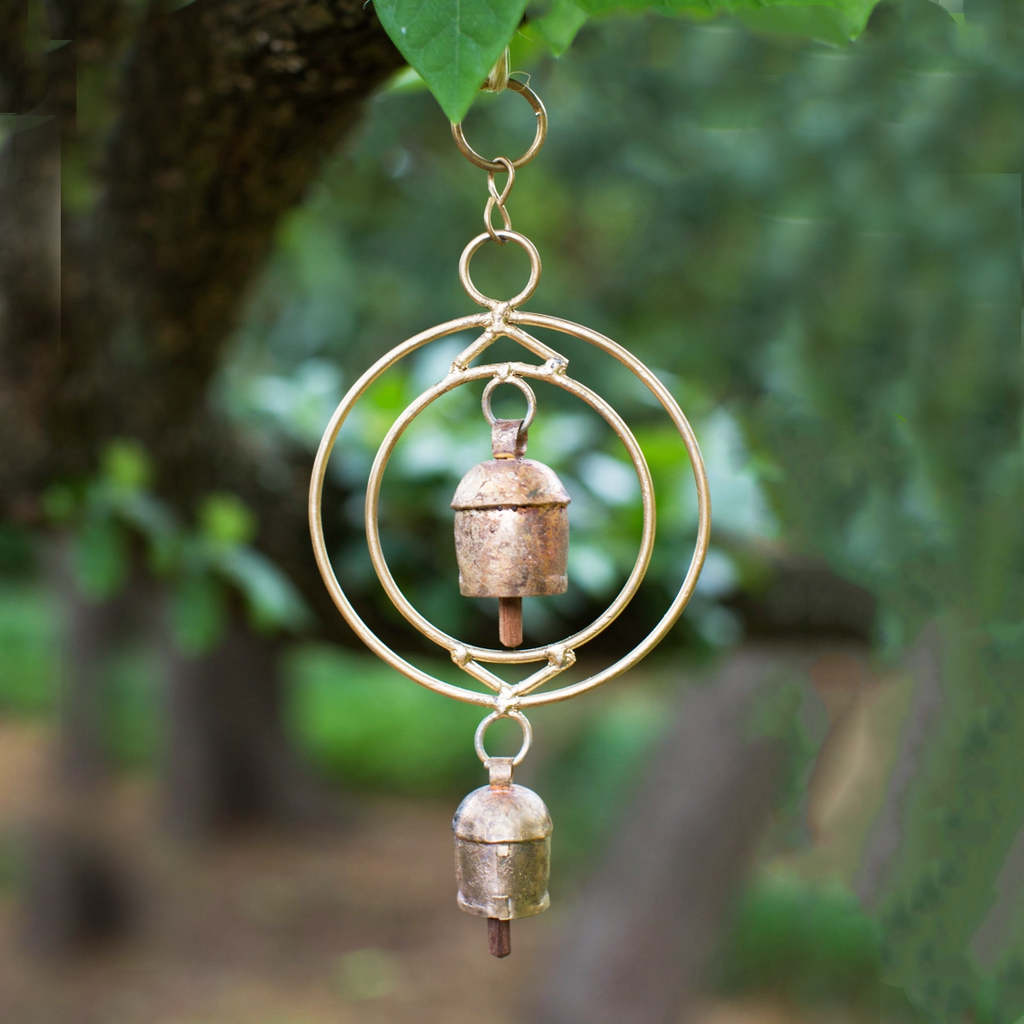 Copper-plated wind chime with 2 circles and 2 bells.