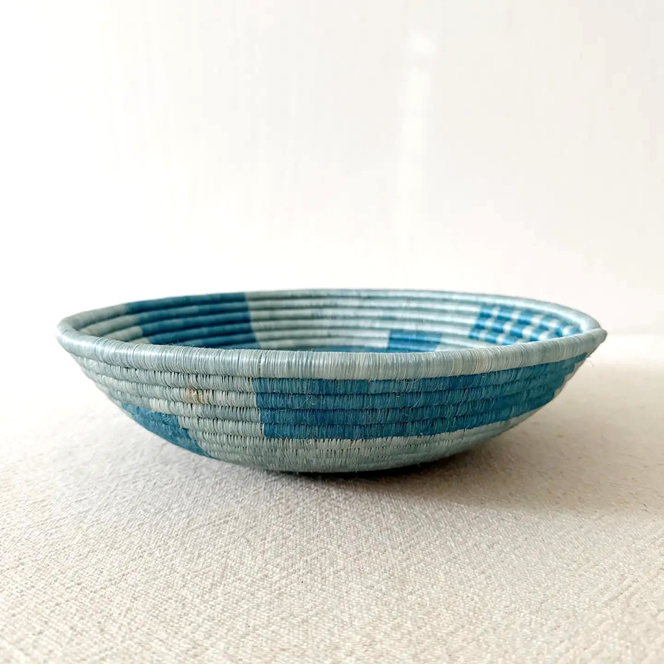 Fair trade sisal sweetgrass bowl basket in blue colors handmade in Rwanda.
