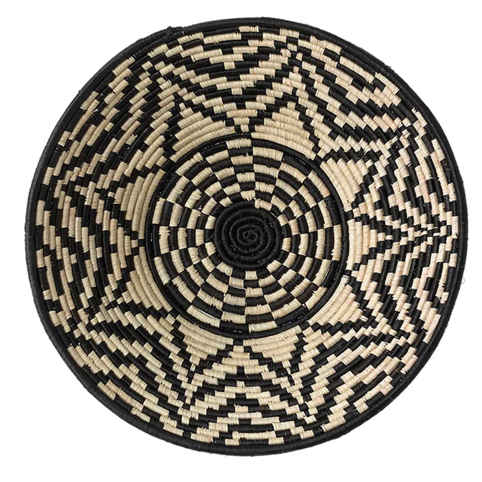 Fair trade black and tan handmade basket with star design.