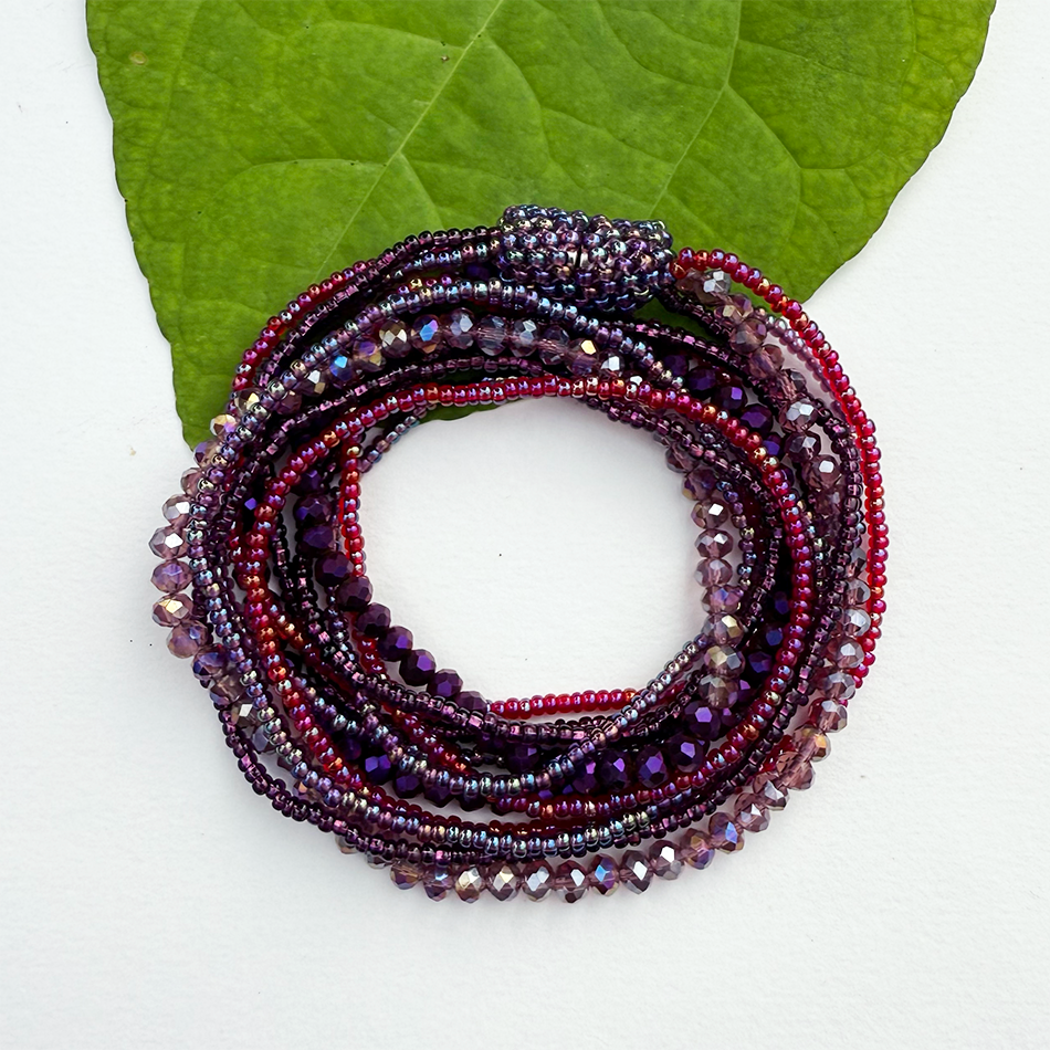 Purple tones beaded bracelet/necklace with magnetic clasp.