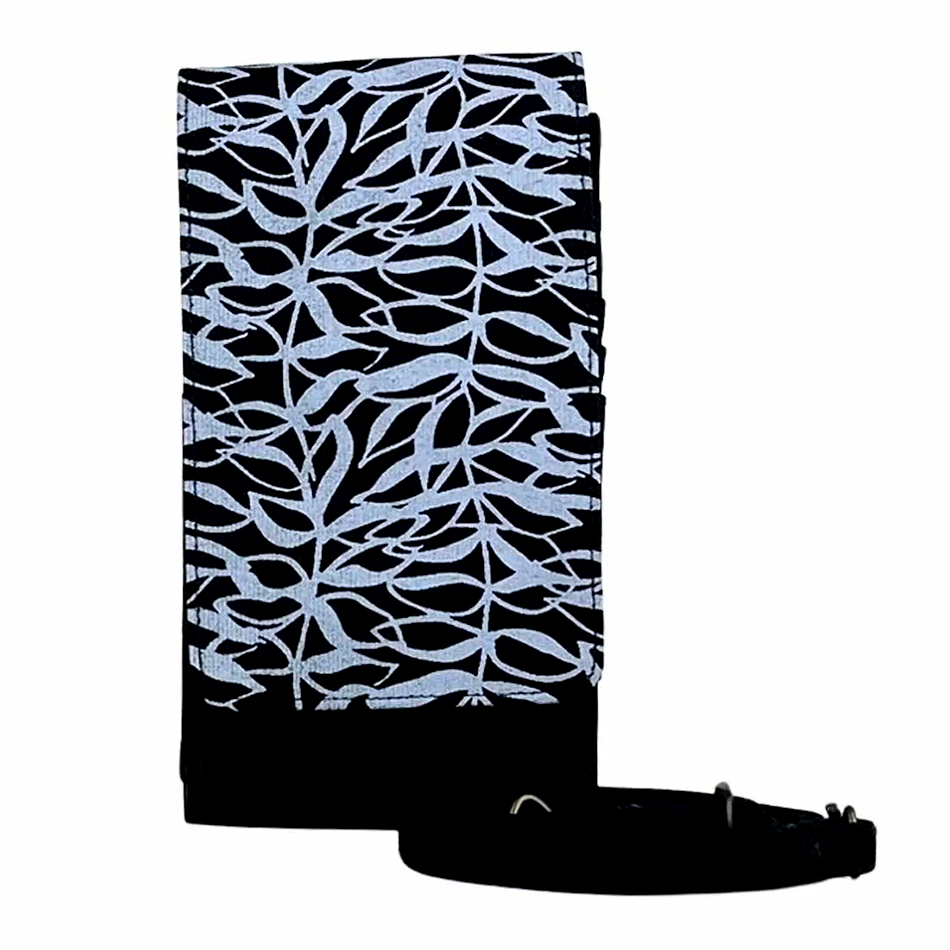 Recycled cotton cell phone bag handmade by human trafficking survivors in Cambodia.