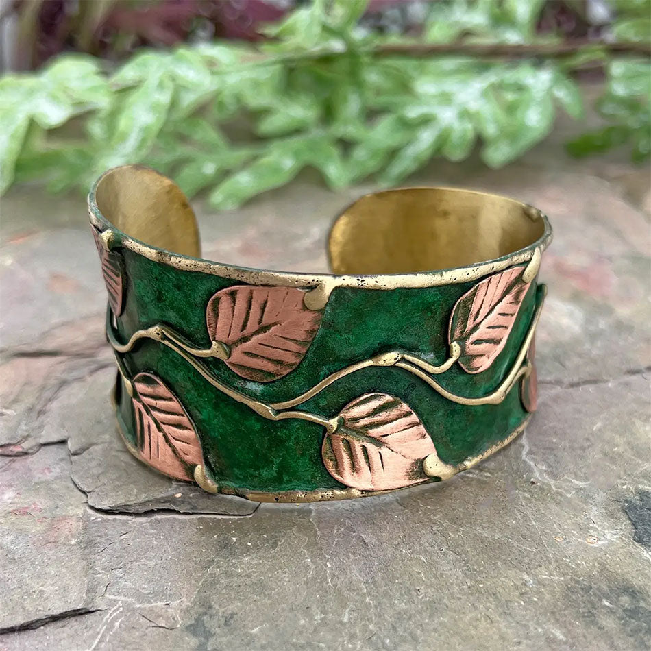FAir trade cuff bracelet with green and brass leaves
