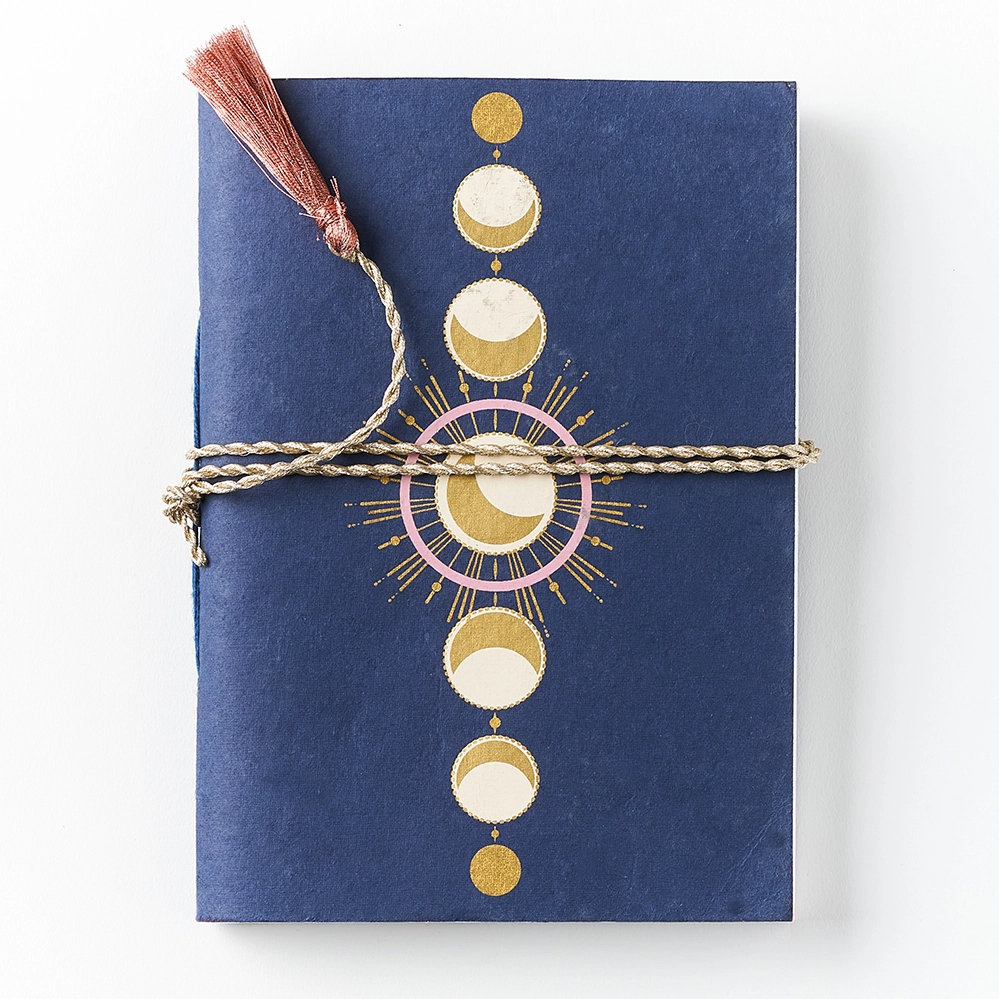 Recycled cotton journal with moon phases design.