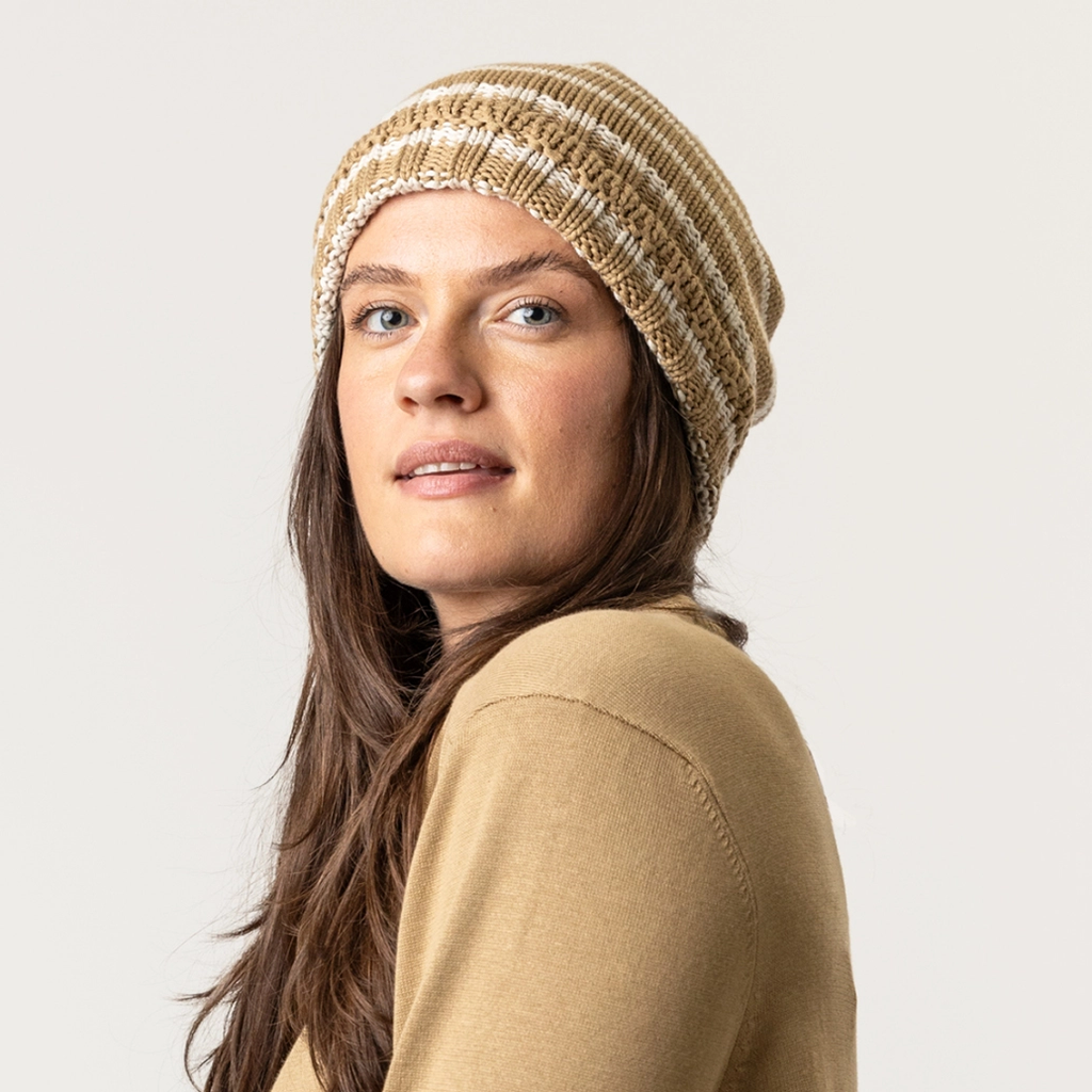 Fair trade organic cotton hat with brown and white stripes.