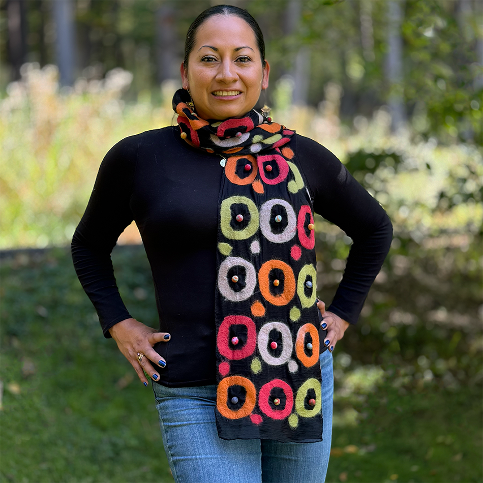 Fair trade silk felted black scarf with orange, purple and green circles.