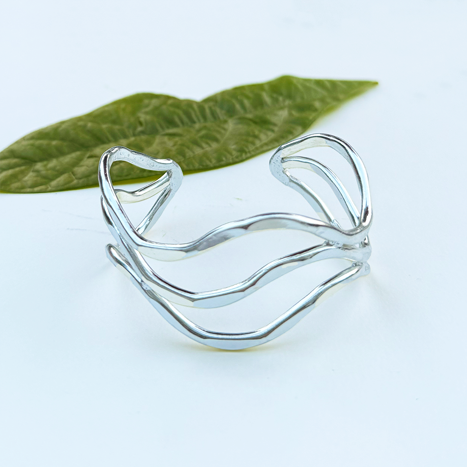 Silver-plated brass hammered cuff adjustable fair trade.