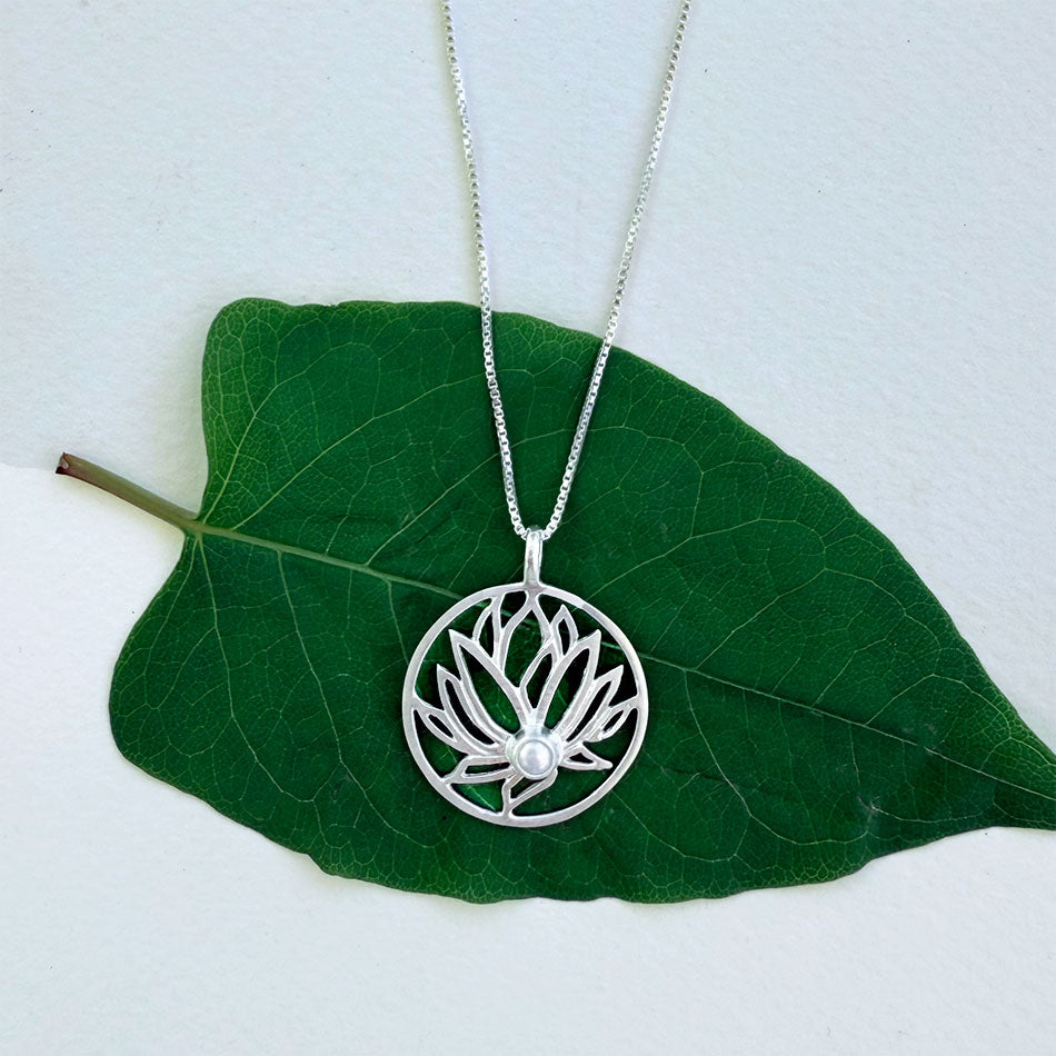 Fair trade sterling silver pearl lotus flower necklace.