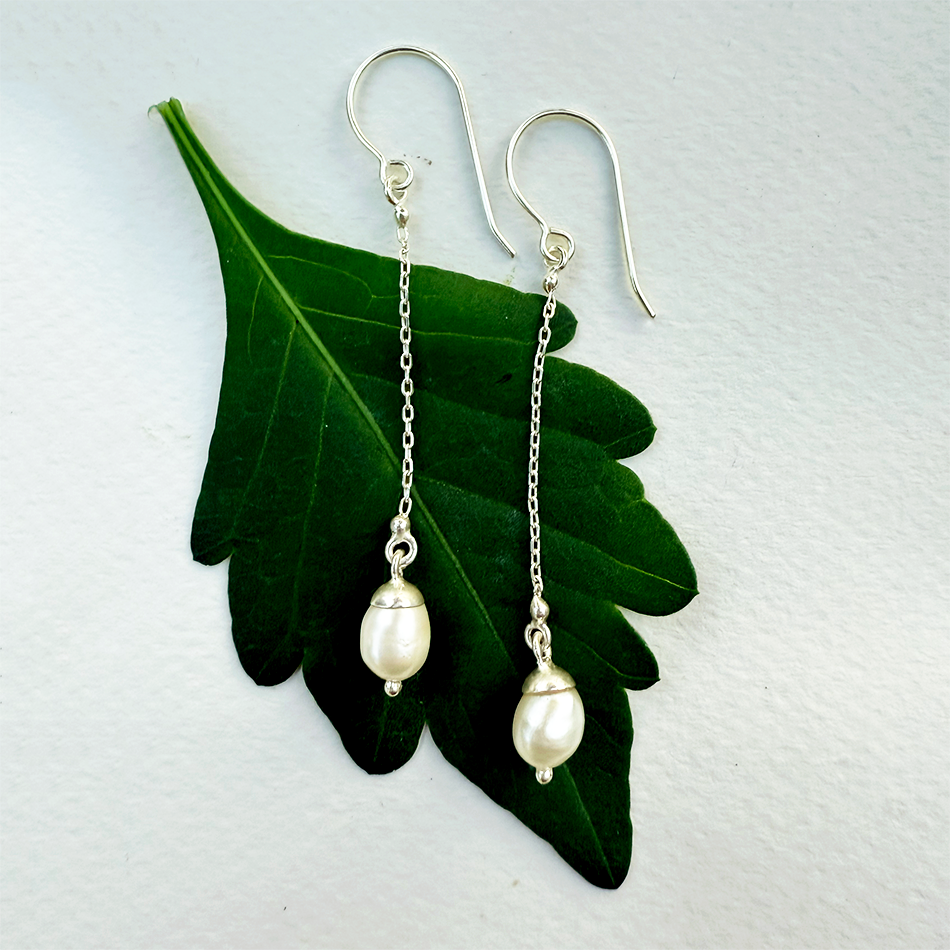 Sterling silver long chain earrings with freshwater pearl.